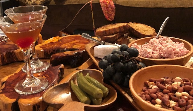 cheese board with manhattans